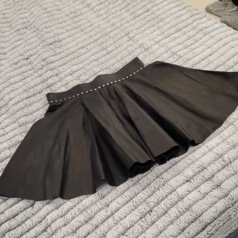 Fun studded black leather mini skirt